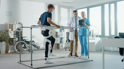 Aufkleber - Modern Hospital Physical Therapy: Patient with Injury Walks Wearing Advanced Robotic Exoskeleton. Physiotherapy Rehabilitation Scientists, Engineers use Tablet Computer to Help Disabled Person