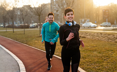 Sticker - Fitness, sport, friendship and lifestyle concept. Smiling sporty couple outdoor