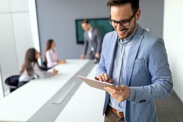 Wall Mural - business coworkers discussing new ideas and brainstorming in a modern office