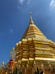 Temple in Chiangmai Thailand with old and antique Lanna style beautiful golden pagoda on the top of the hill