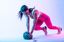 Woman Training With The Exercizes Ball In The Gym