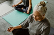 © rawpixel.com - People meditating in a yoga class