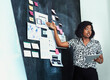 © rawpixel.com - Businesswoman brainstorming using a blackboard