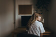© rawpixel.com - Woman sitting in front of a computer during coronavirus quarantine