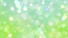 Glittering green particles. 4K background material for loop playback