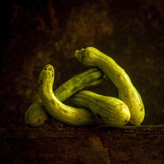 Canvas Print - Closeup shot of green ugly zucchini on the table