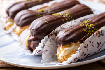 Wall Mural - Traditional french eclairs with chocolate.