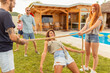 © Impact Photography - Friends participating in limbo dance contest