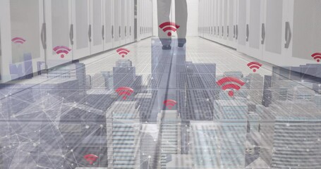 Poster - Animation of skyscrapers with wifi symbols and caucasian man working in a server room