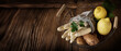 Tied fresh white asparagus on rustic wood. Close-up with short deep of focus. Background for nutrition and gastronomy concepts with space for text.