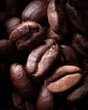 Coffee, as a close-up with selective focus roasted beans 