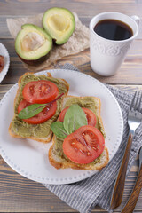 Poster - Breakfast with fried eggs and bacon and sandwiches with guacamole sauce