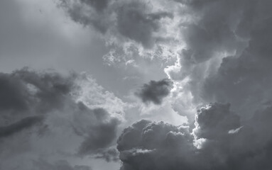Wall Mural - dark dramatic sky and clouds. background for death and sad concept. gray sky and fluffy white clouds