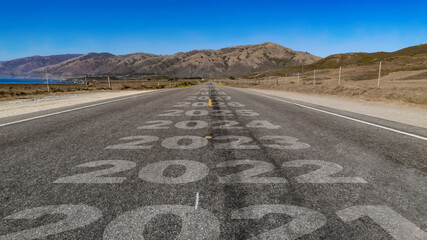 2021-2031 written on highway road to the mountain