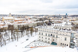 Fototapeta Młodzieżowe - Aerial view of Vilnius old town, capital of Lithuania in winter day with snow