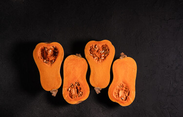 Wall Mural - Raw organic butternut squash on grey background