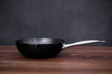 grill pan on wooden table background