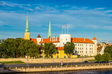 Cityscape To Riga Castle Is Located On The Banks Of River Daugava, Old Town. Rigas Pils Official Residence Of President And Museum Of History And St. Peters Cathedral Church. RIGA Capital Of Latvia.