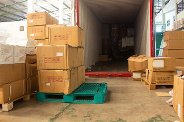 Wall Mural - The cartons with loading out of container