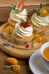 Sticker - Autumn and winter baked pastries. Healthy muffins with traditional fall spices With tea cup. White marble table, copy space