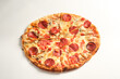 © Danil - Pepperoni pizza isolated on white background. Italian food concept. Appetizing pizza.