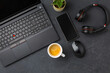 © Brebca - Working place and office desk with coffee, laptop, headset and smarthpone
