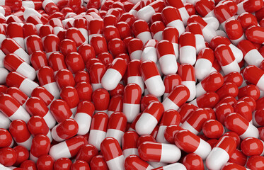 Heap of red capsules. Medicine background