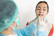 © Satjawat - Check point for Coronavirus,Examining nasal mucus test from child girl,taking a swab inserted into the nostril,health check,physical exam for diagnosis of COVID-19,service and testing in the hospital.