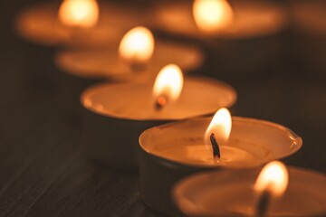 candle background fire dark flame, candlelight celebration.