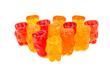 © Olga - Children's vitamins in the form of bears are arranged in rows. A lot of multi-colored jelly sweets for children.