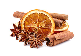 Dry orange with  cinnamon  and anise on white background closeup. Citrus with spices.