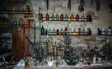 Old Scary Laboratory Mining Tools & Measuring Devices. Bottles In Old Pharmacy Laboratory. Old Vintage Mini Laboratory. Medieval Drugs Potion On Dirty Shelf, Apothecary Cabinet In Pharmacy Lab Or Shop