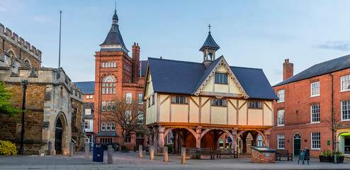 A panorama view across the old church square in Market Harborough, UK on a spring evening