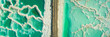 © AmazingAerialAgency - Panoramic aerial view of salt veins from 2 sides of a road that cross in the middle. Dead sea, Negev, Israel.