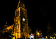 A view past the old church towards the square in Market Harborough, UK on a winters night