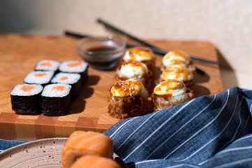 Wall Mural - Sushi set and chopsticks on napkin