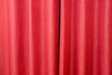 Fototapeta  - Closed red theater curtain, silk background.