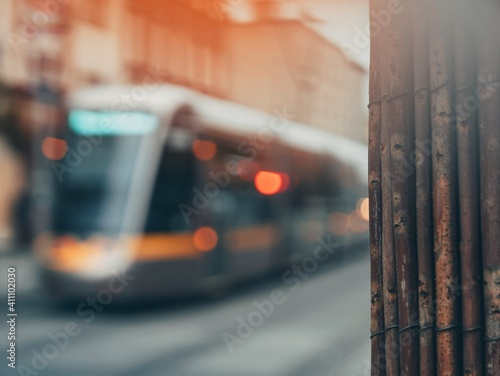 Obraz Dibond Close-up Of Wood With Cable Car Moving On Street In City