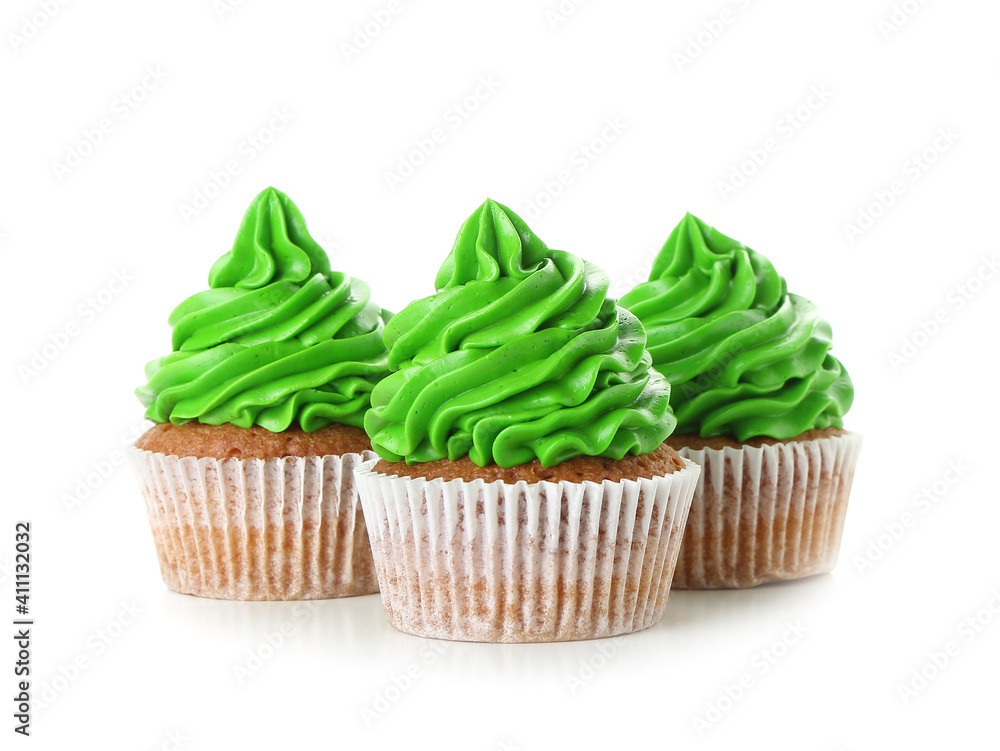 Tasty cupcakes for St. Patrick's Day on white background