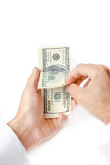 Business Money dollars in the hands on a white background