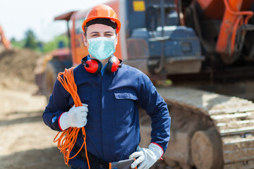 Wall Mural - Portrait of worker in a construction site