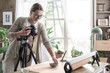 © StockPhotoPro - Photographer preparing food for shooting