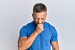 © Krakenimages.com - Handsome muscle man wearing casual clothes feeling unwell and coughing as symptom for cold or bronchitis. health care concept.