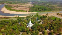 4K-Top View From Flying Drone Over Wat Phra Phut Tha Bat,temple And Pagoda  In Mahashanachai Town, Yasothon  Province,Thailand,ASIA.