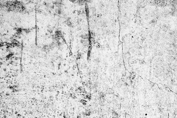 Texture of a concrete wall with cracks and scratches which can be used as a background