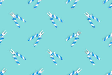 Pliers seamless pattern. Metal pliers with rubber striped grips. Background made of tools. 