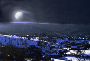 Wall Mural - Full moon rises from behind a hill, snowy hills and houses