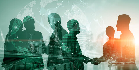 Wall Mural - silhouette view of business people team in group meeting on city office building background showing 
