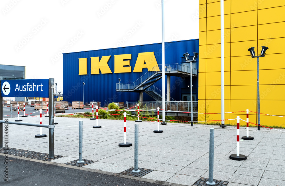 Stock-Foto „Koblenz, Germany, 01.31.2021: IKEA sign at store against blue sky. Founded in Sweden in 1943 IKEA has been the world's largest furniture retailer since at least 2008.“