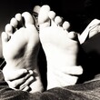 © Pascal Huot - Les pieds d'un enfant